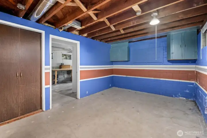 Basement area adjacent garage. So much potential!
