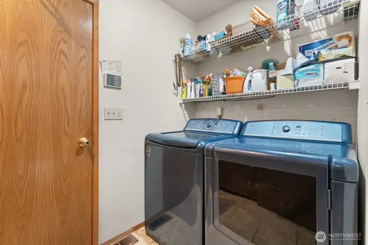 Laundry room leads to the garage Laundry room leads to the garage