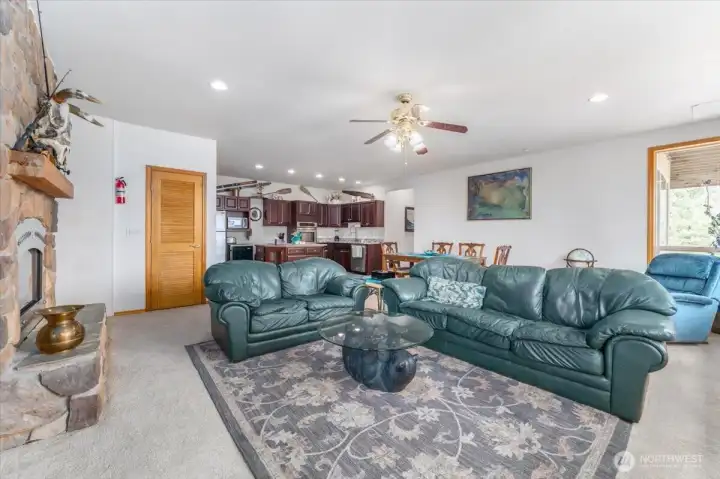 Lower livingroom w stone fireplace