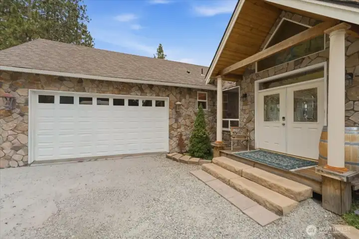 2 car garage with garage doors on both ends