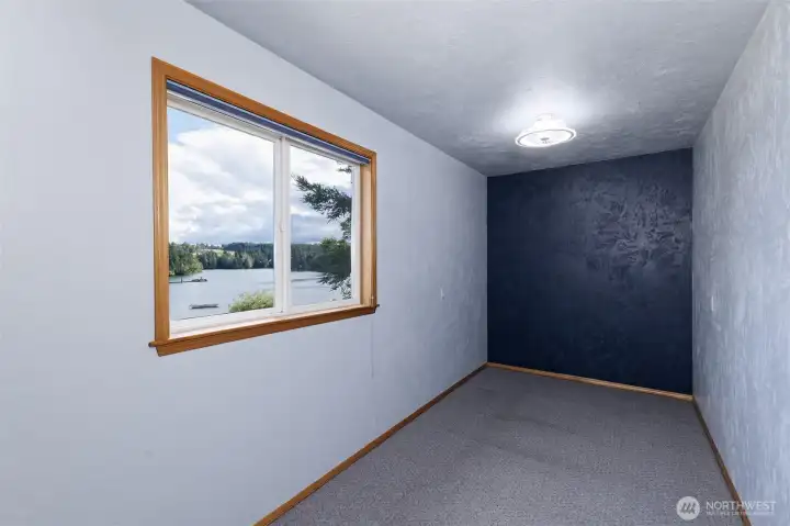 This is a small room off of the garage that could be used for an office, workout room, play room, hobby room, etc. This is a small room off of the garage that could be used for an office, workout room, play room, hobby room, etc.