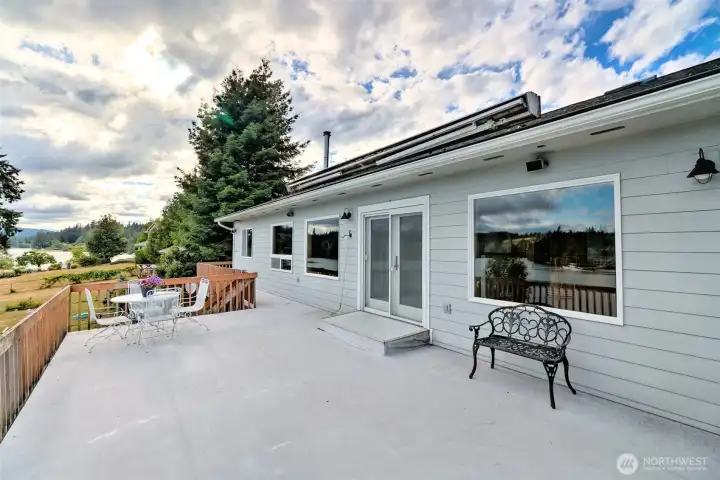 Lovely deck, and it even has a roller-shade for those warm summer days. Lovely deck, and it even has a roller-shade for those warm summer days.