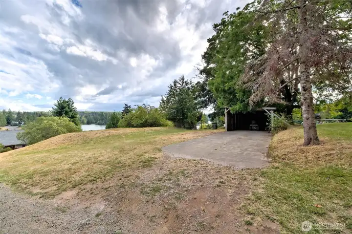 Halfway down the driveway is a pull-off spot with a carport. great for additional parking. There is also RV parking here with water and power. Halfway down the driveway is a pull-off spot with a carport. great for additional parking. There is also RV parking here with water and power.
