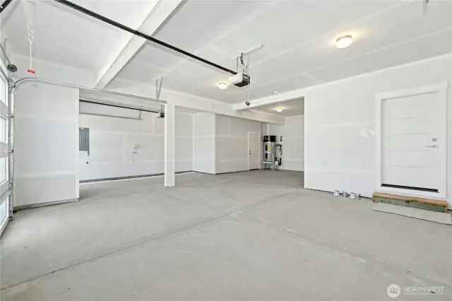 3 Car Garage w/ Shop space.