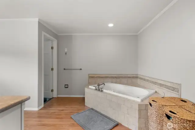 Look at that awesome soaking tub. The door to the left goes to the loft/bonus room.