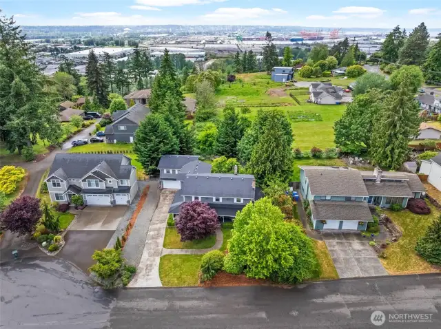 Aerial view of quiet cul-de-sac location with beautifully landscaped surroundings.
