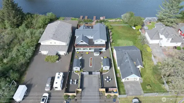 Stunning, turnkey, waterfront property. Zoned for residential or commercial use - waterfront business (boat/kayak rental, boat repair, nightly rentals)