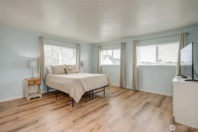 Spacious primary suite with lots of light