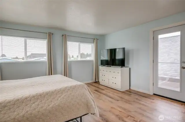 Primary suite has access to the front balcony