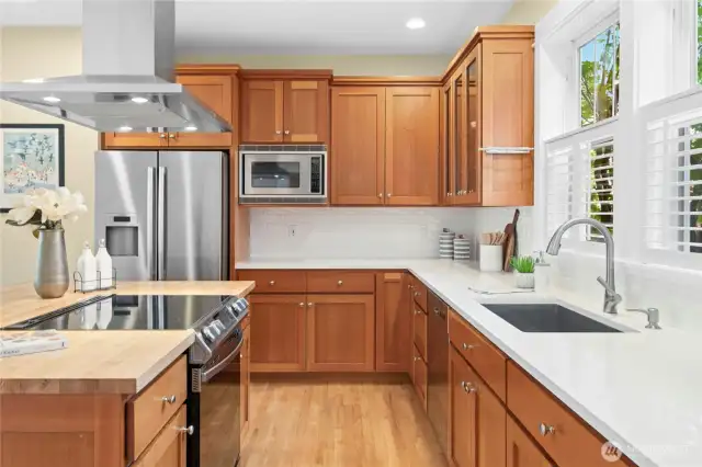 Great counter space and storage in the quality solid wood cabinetry. The induction range and pro hood are also recent updates.