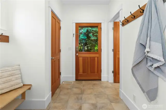 The convenient mudroom area for shoe and coat storage. This is also a nice short-cut to the Studio over the garage.