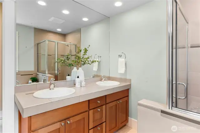 This bathroom has been updated with modern tiles and fixtures.