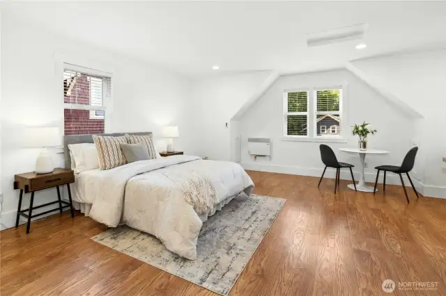 The roomy 460 sq ft Studio above the garage with a kitchenette and 3/4 bathroom.