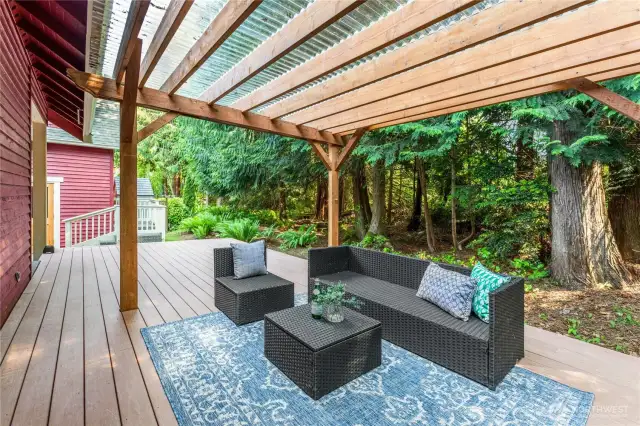The large Trex deck out back is a lovely space to enjoy the outdoors after dinner.