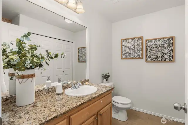 Powder room adjacent family room.
