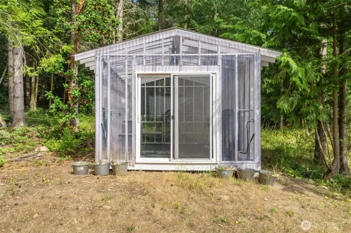 Heated green house and chicken coop.