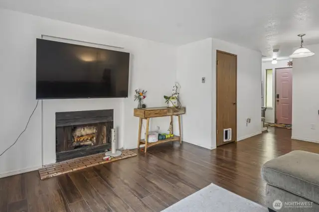 Unit A of the duplex offers a comfortable main floor living space with easy care flooring.