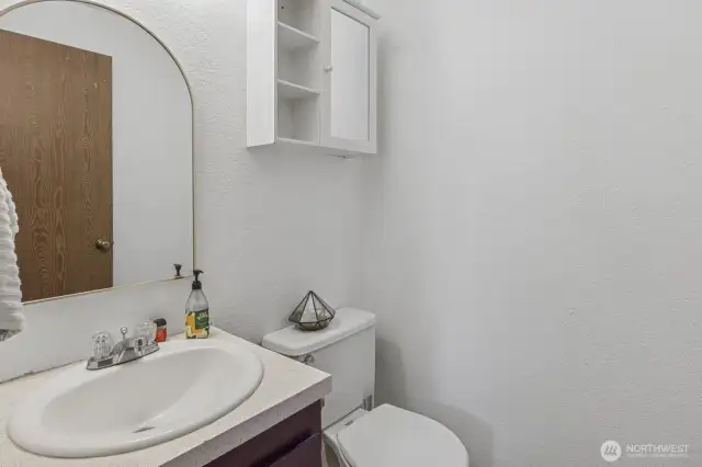 Convenient half bath on main level.