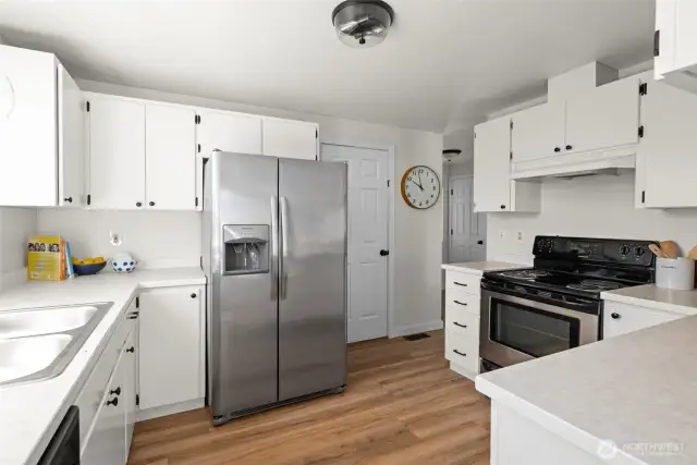 Enjoy meal prep in the light and bright updated kitchen!