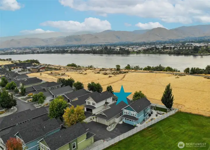 On the front line- the RIVER and VIEW side of the community! Apple Capitol loop trail just steps away!