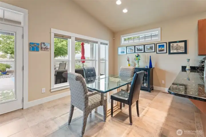 Peninsula seating- and dining table- OR enjoy your meals on the 35'x21' concrete patio!