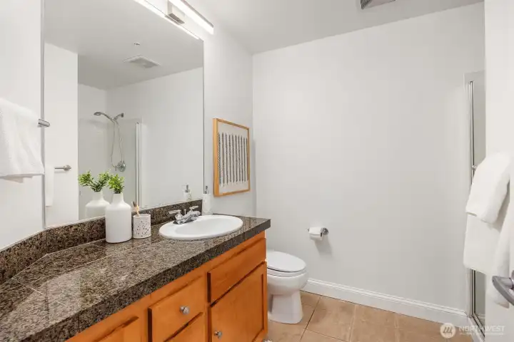 Second 3/4 guest bath next to the 2nd bedroom.