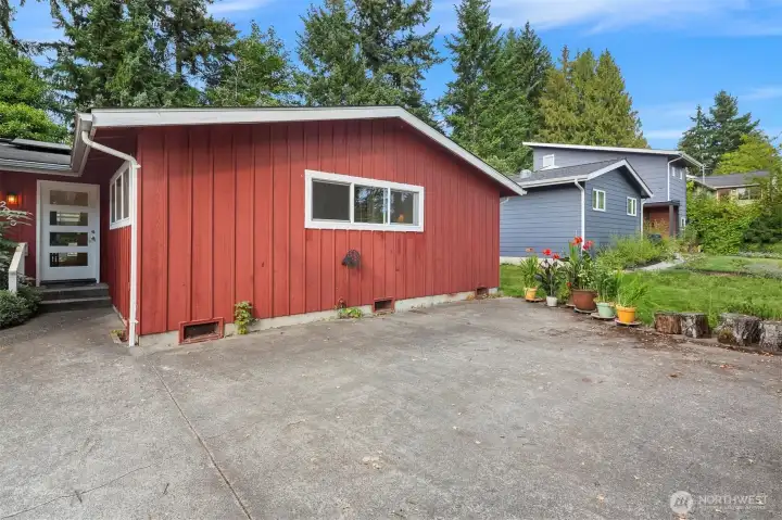 The parking pad, in addition to the attached garage and the lower off street parking on 102nd.