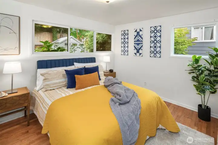 The second bedroom offers more of the gorgeous hardwood floors and quite a lot of space!