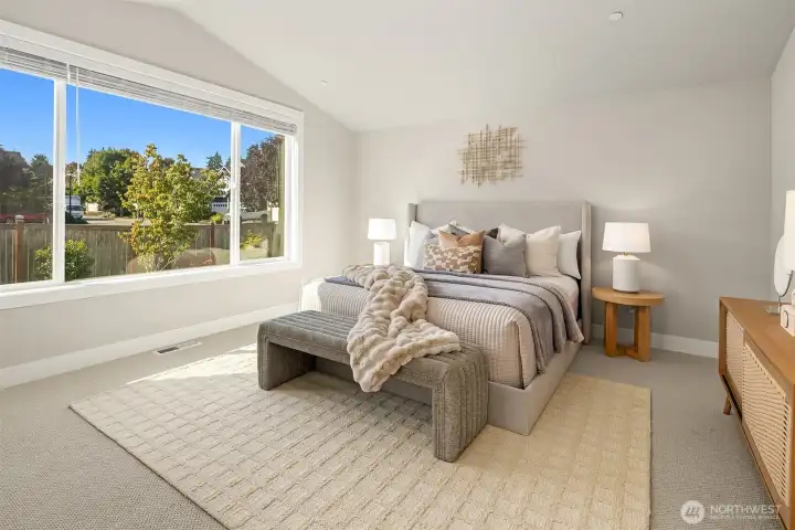 Welcome to your sanctuary primary ensuite.  Vaulted ceilings with loads of room for dressers and sitting area.