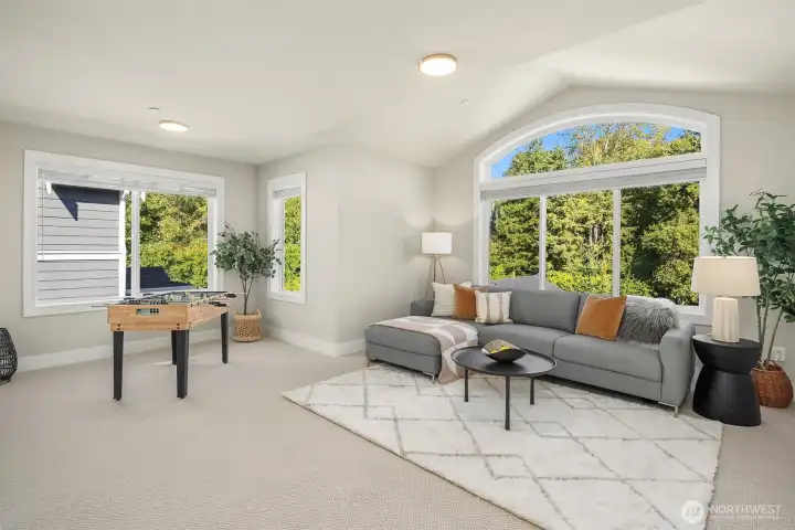 Bonus room off the top of the stairs.  Love the scenery out this window.  Great space for all your fun.