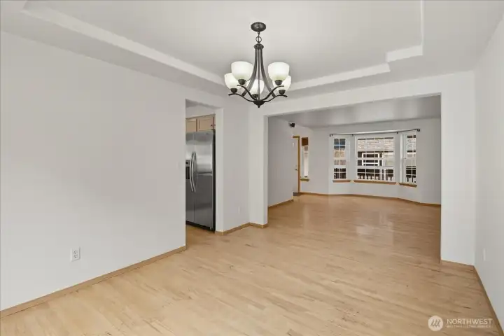 Another view of the dining room leading into the kitchen.