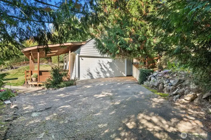 Detached two car garage with covered deck