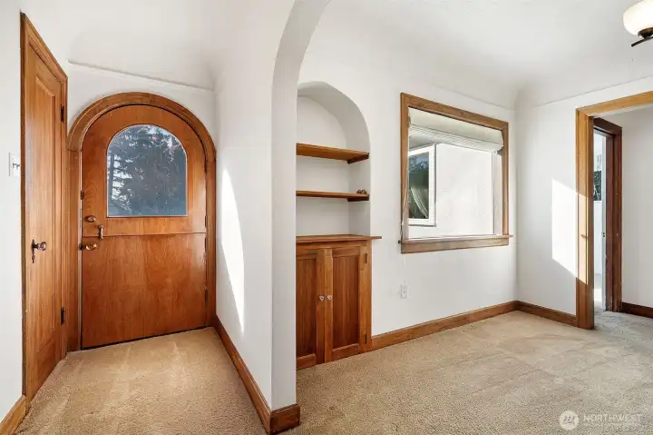 Original front door with formal dining room to the right
