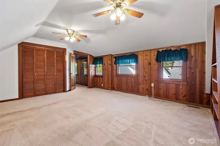 Second upstairs bedroom features a walk-in closet