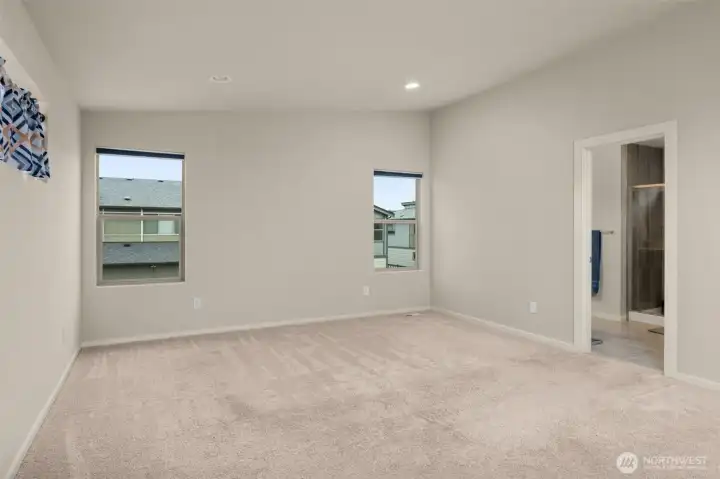 Large primary suite with plenty of light