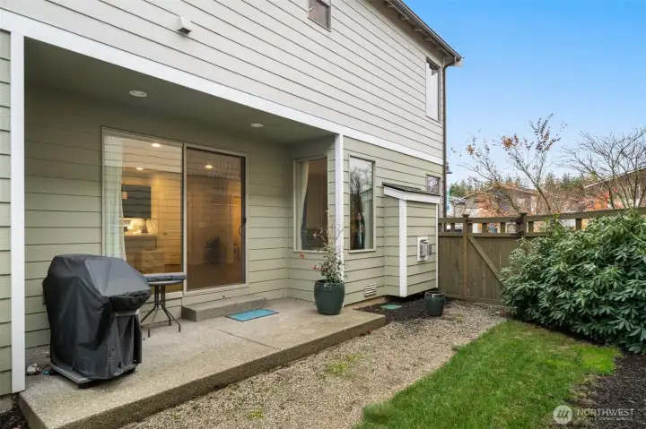 Private side yard with covered outdoor living
