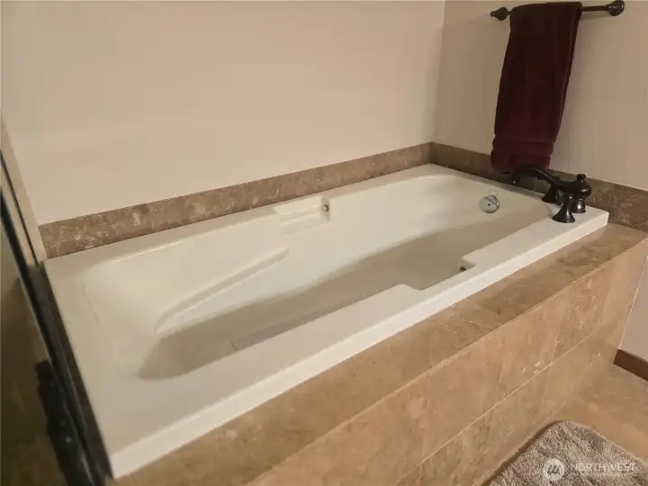 Primary bath soaking tub