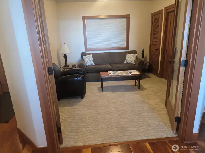 Guest room w/ sleeper sofa. Also has views of the water