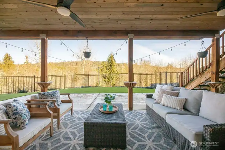Covered patio off basement game room.