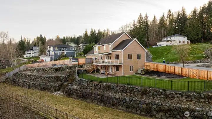 Massive property backing up to woodlands. Shy 1 acre corner lot.