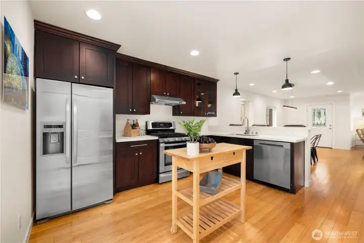 Solid countertops and a brand new dishwasher.