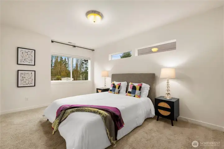 Upstairs to the primary bedroom. Features new paint, walk in closet and a five piece ensuite bathroom.