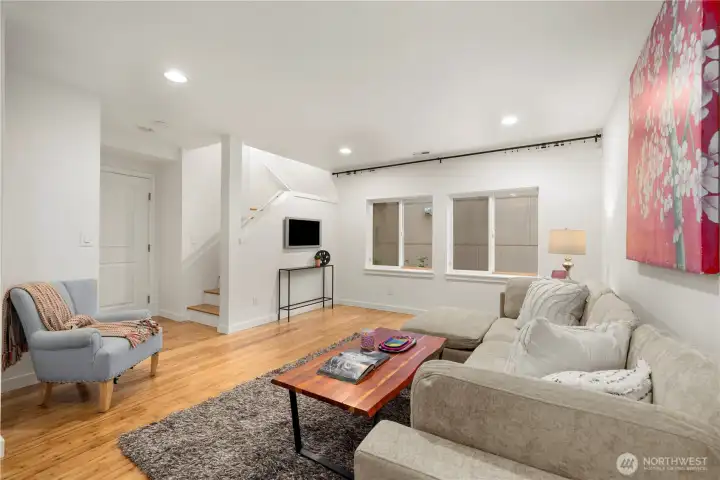 Lower level has a very large great room. Brand new bamboo here and on the stairs.