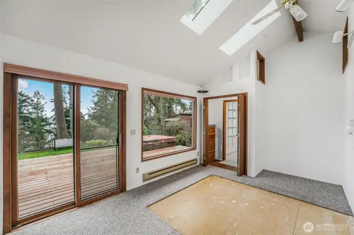 The other bedroom also has access to the outdoors and incredible views with the bonus of a large walk-in closet.