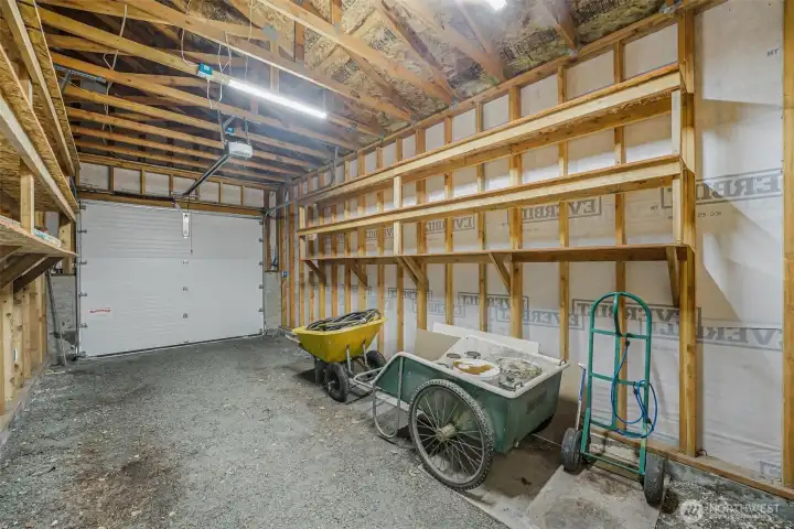 The garage attached to the shop.