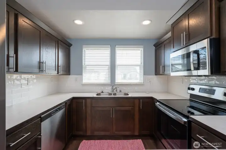 Remote controlled blinds for the kitchen! Fun touch!