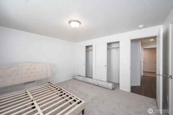 Double sliding closets + a third closet in the Primary!