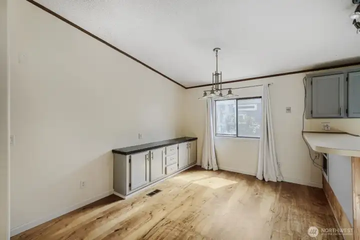 Dedicated dining space with great natural light—ideal for everyday meals or hosting friends.