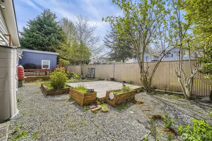 Private, low-maintenance backyard with patio space—perfect for enjoying the outdoors without the upkeep.