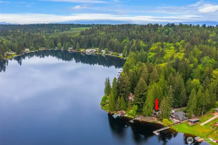 Surrounded by evergreens, the setting feels peaceful and private yet just minutes from tech hubs and downtown Redmond.